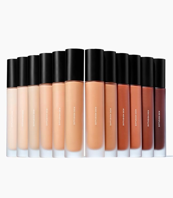 MAKE Beauty Diffusion Dew Skin Tint. Sheer to Medium Coverage Radiant Finish. Blurring, Smoothing, and Brightening for Glowing Complexion. Enhanced with Niacinamide and Adenosine. Bronze 14